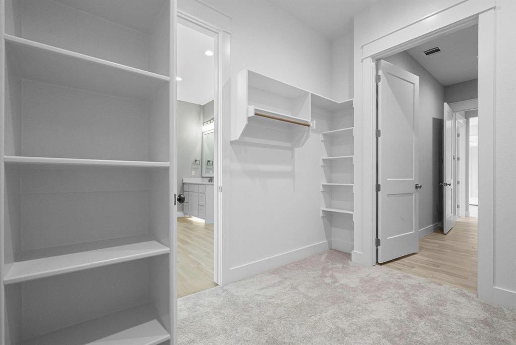 2041 Carrie Court Weatherford, TX 76088 - Photo 20 of 36 a view of an empty walk in closet and entryway