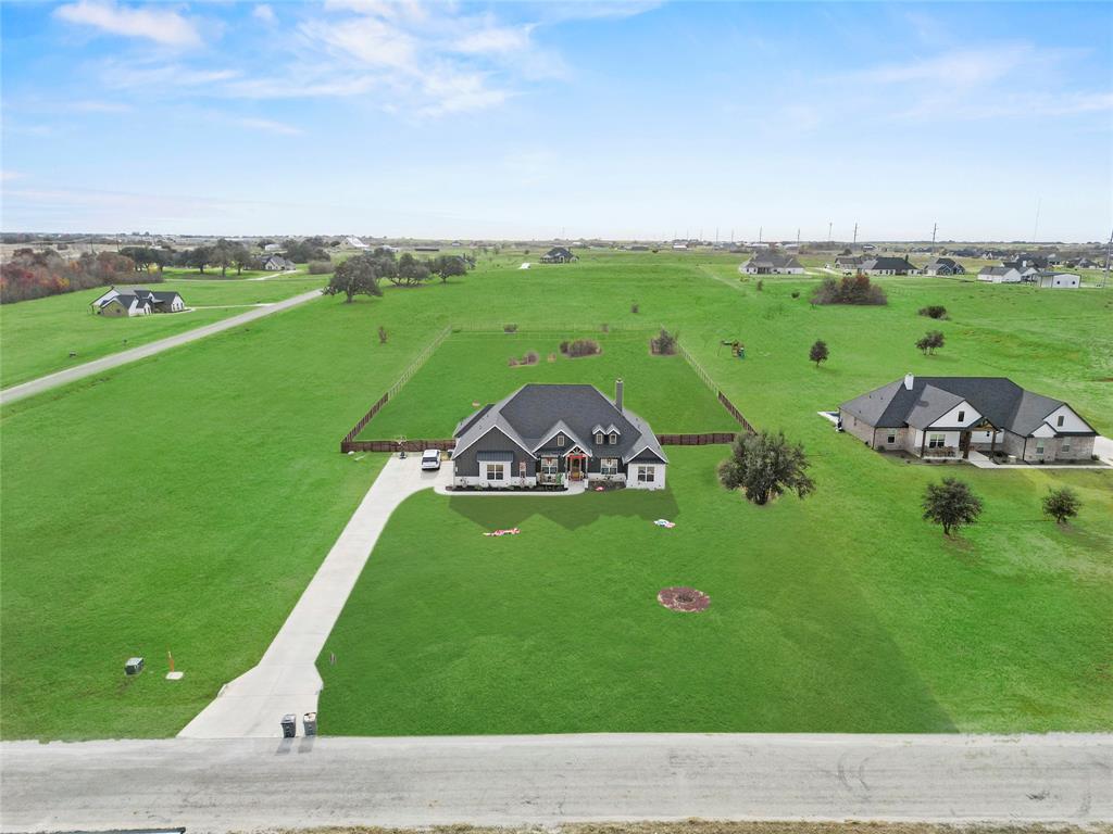 2041 Carrie Court Weatherford, TX 76088 - Photo 3 of 36 a view of a golf course with a garden