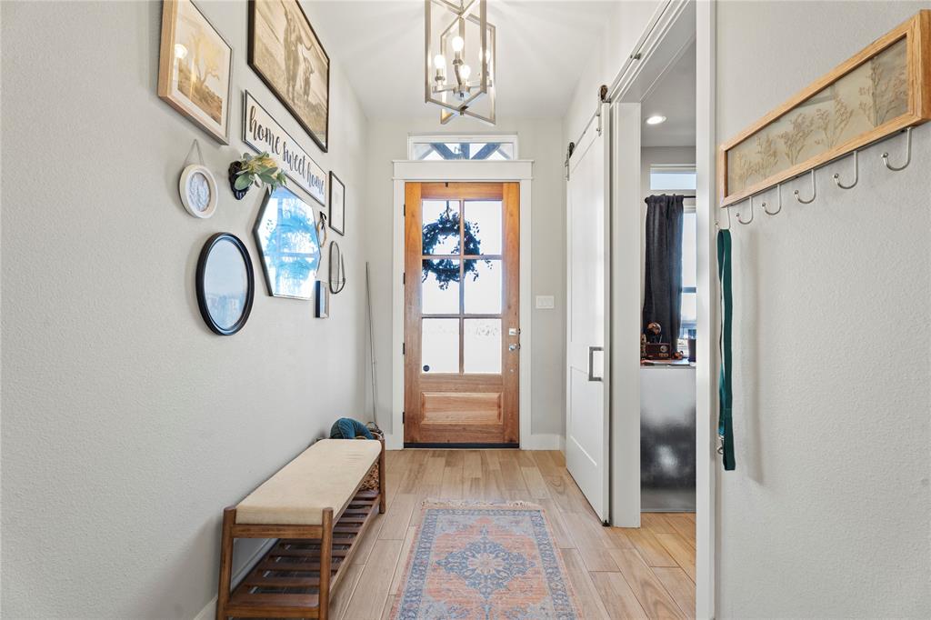 2041 Carrie Court Weatherford, TX 76088 - Photo 4 of 36 a view of an entryway with wooden floor