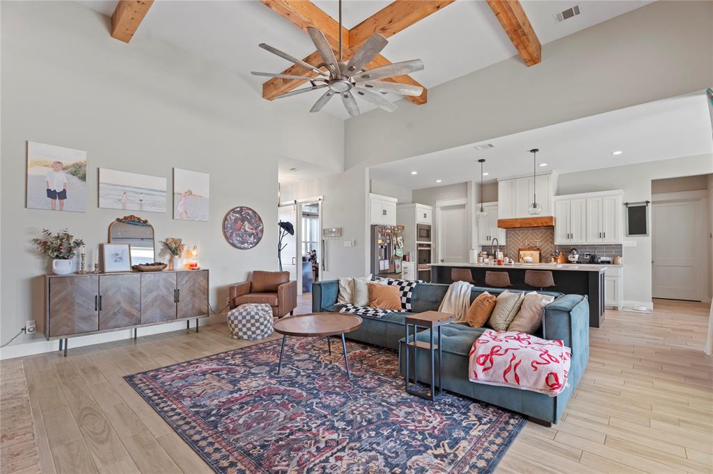 2041 Carrie Court Weatherford, TX 76088 - Photo 8 of 36 a living room with furniture and kitchen view