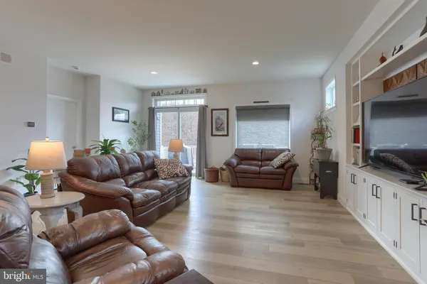 a living room with furniture and a couch