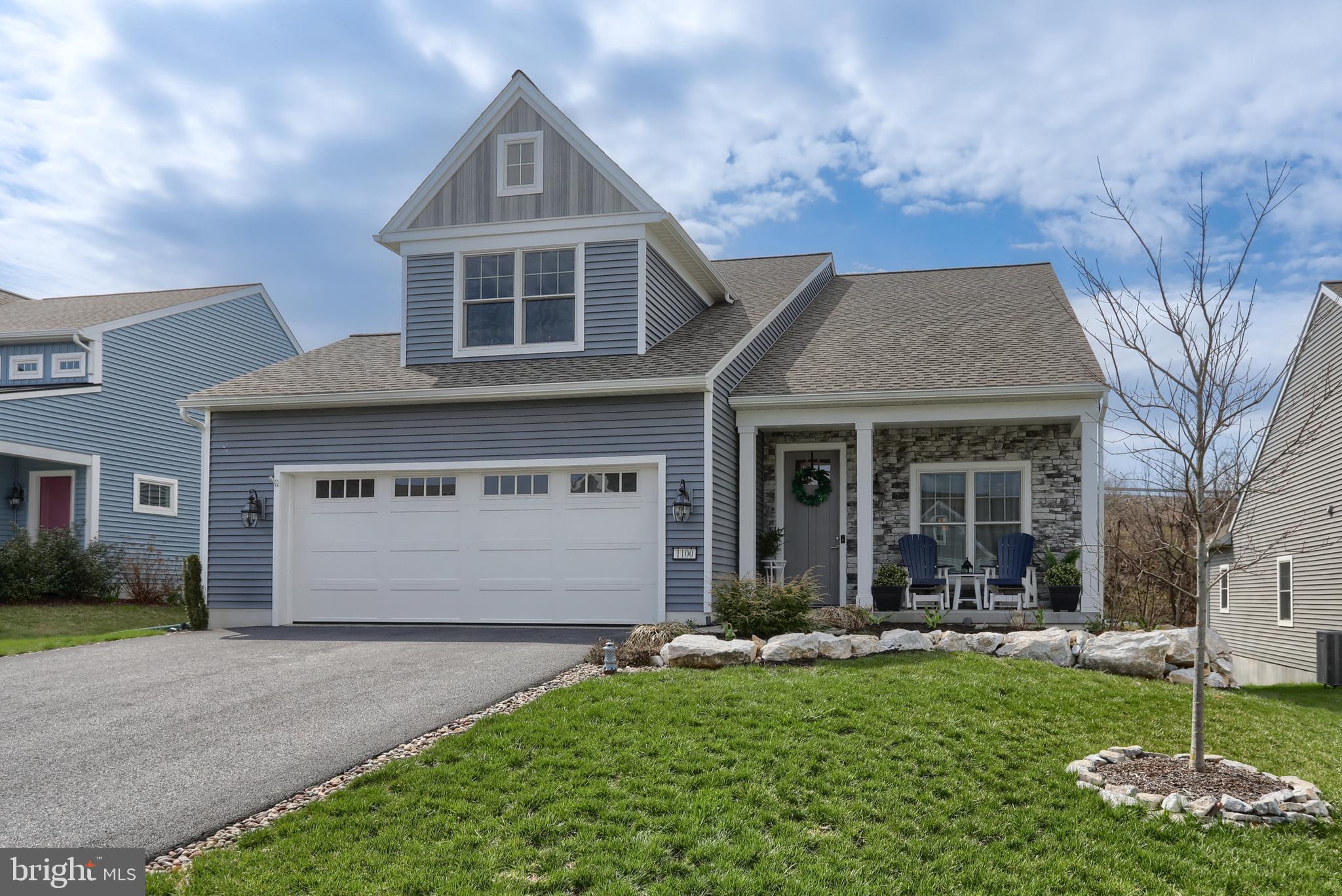 1100 Alden Way Lebanon, PA 17042 - Photo 2 of 52 a front view of a house with a yard and garage
