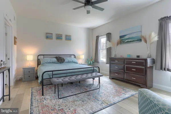 a bedroom with a bed and furniture