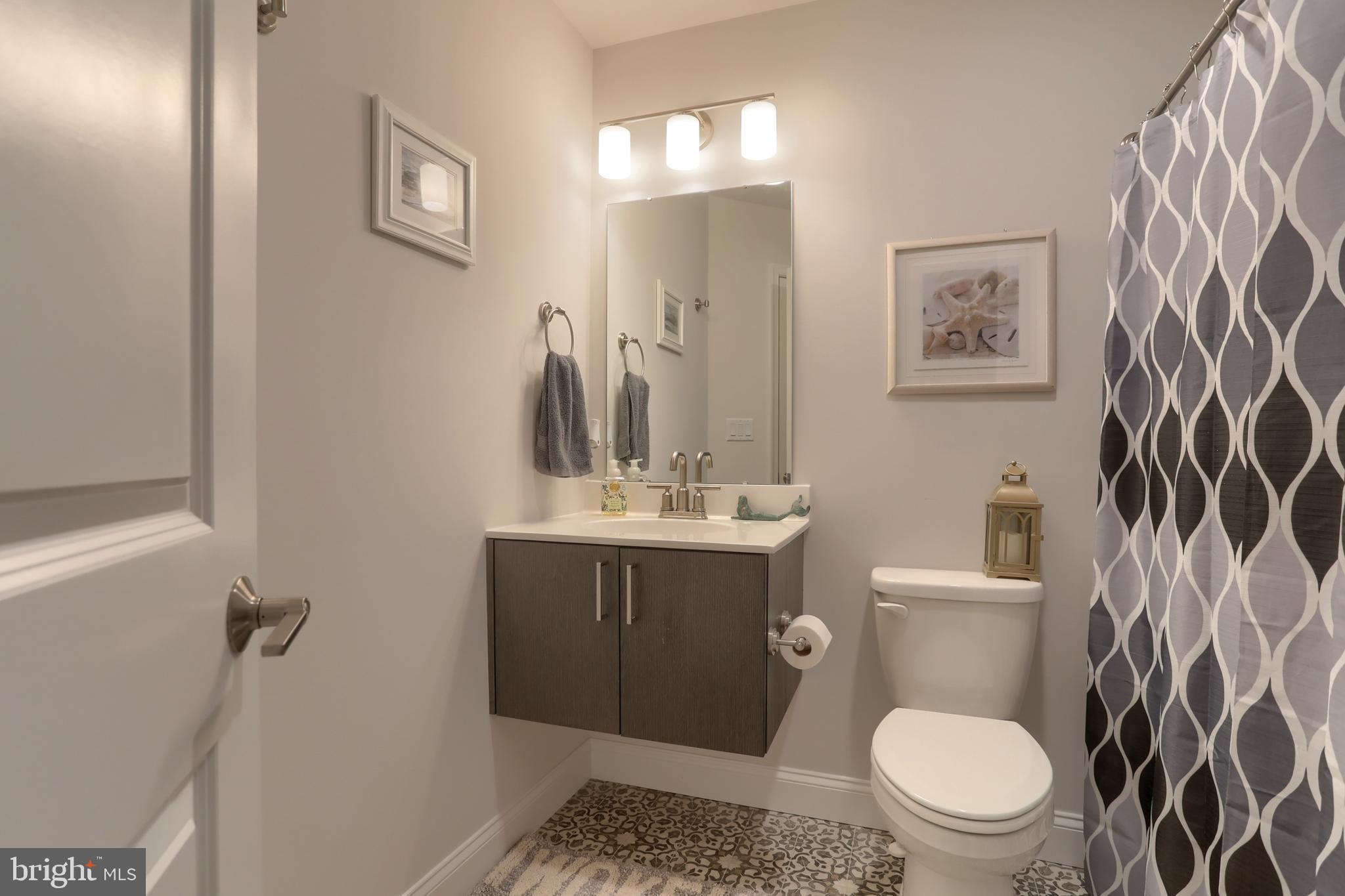 1100 Alden Way Lebanon, PA 17042 - Photo 34 of 52 a bathroom with a toilet a sink and mirror