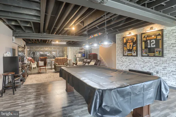 a view of kitchen with granite countertop lots of counter top space