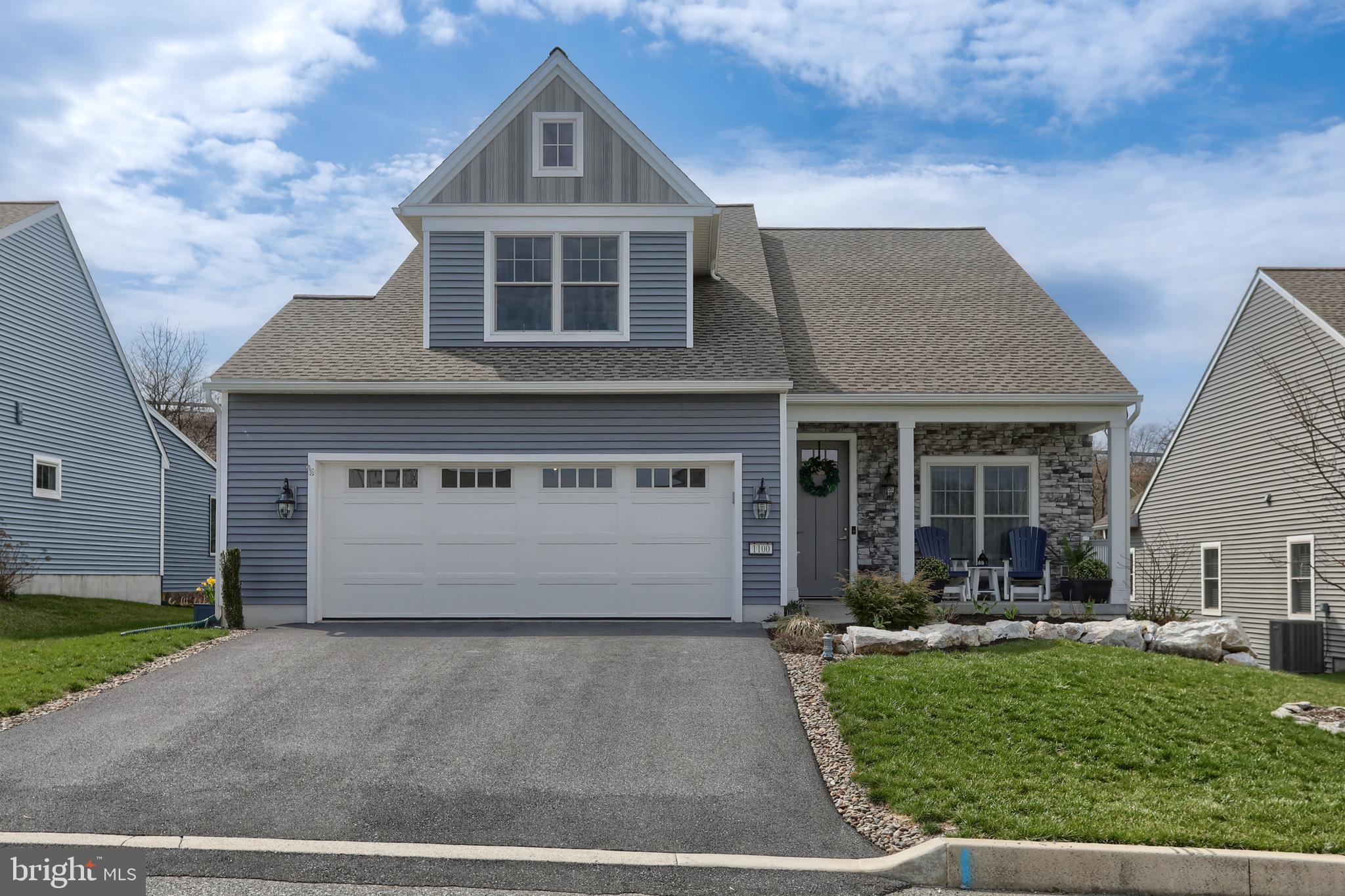 1100 Alden Way Lebanon, PA 17042 - Photo 4 of 52 a front view of a house with a yard and garage