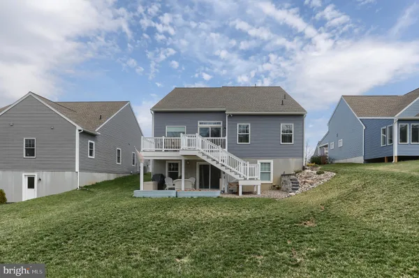 front view of a house with a big yard