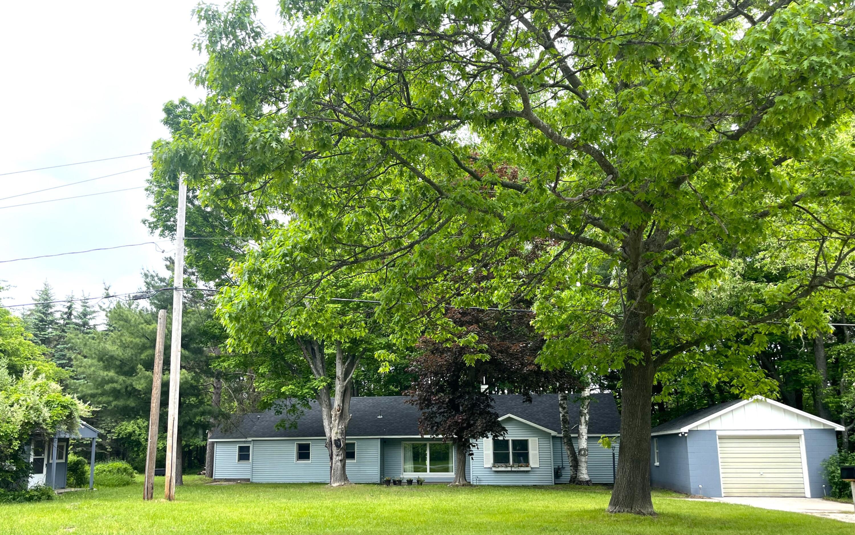 7818 Homestead Road Benzonia, MI 49616 - Photo 1 of 27 carihouse4