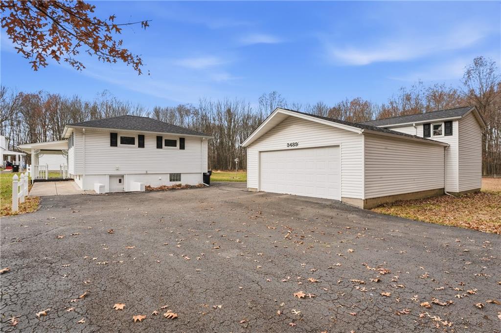 3489 Sample Road Hermitage, PA 16148 - Photo 5 of 33 a view of a house with a backyard