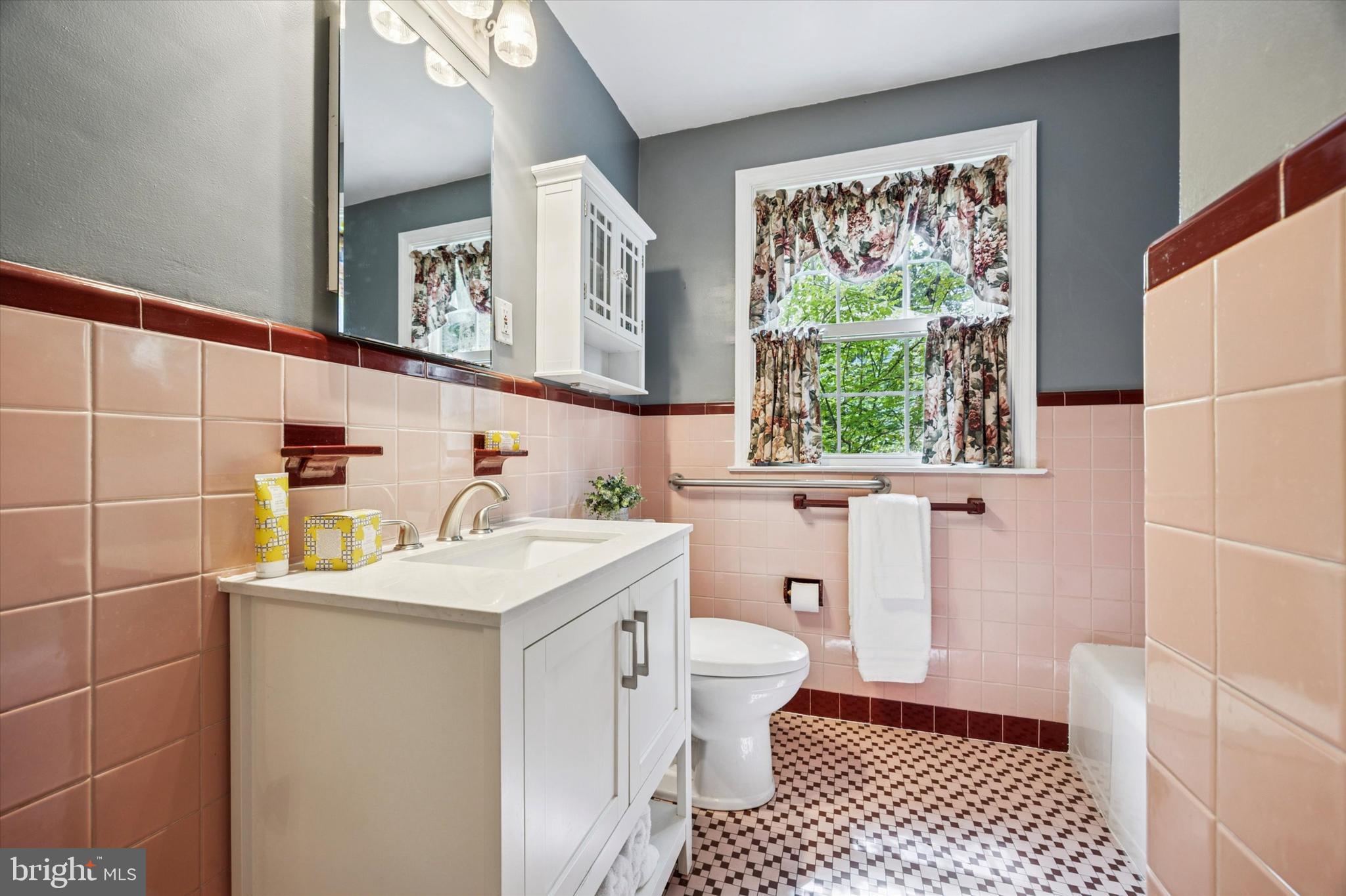 444 Kerr Lane Springfield, PA 19064 - Photo 21 of 35 a bathroom with a sink a toilet and a window