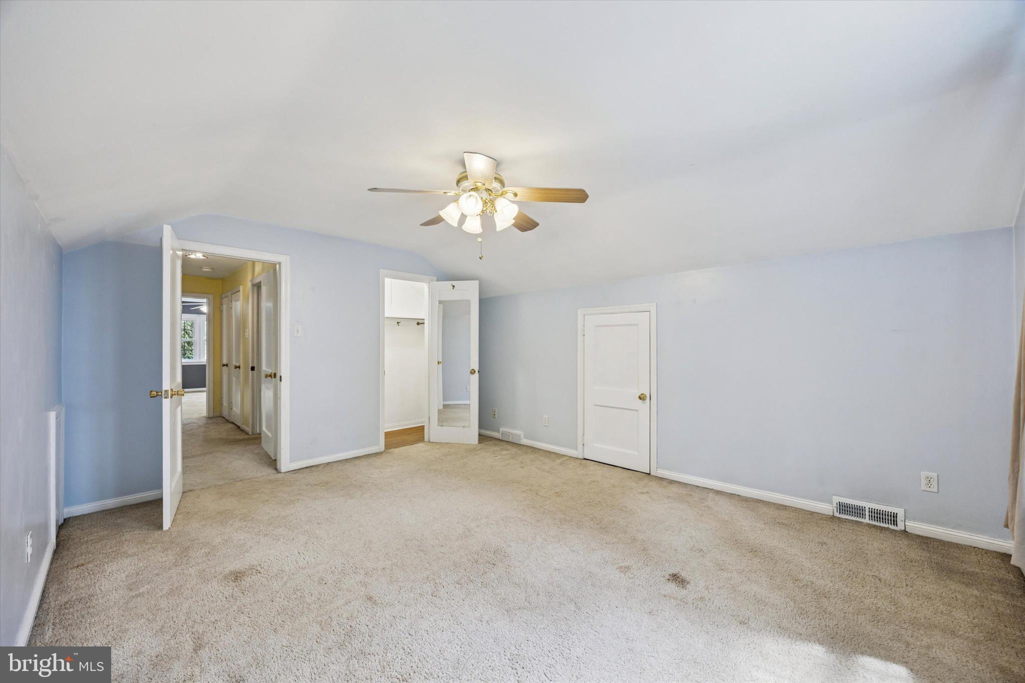 444 Kerr Lane Springfield, PA 19064 - Photo 27 of 35 an empty room with closet and a chandelier fan