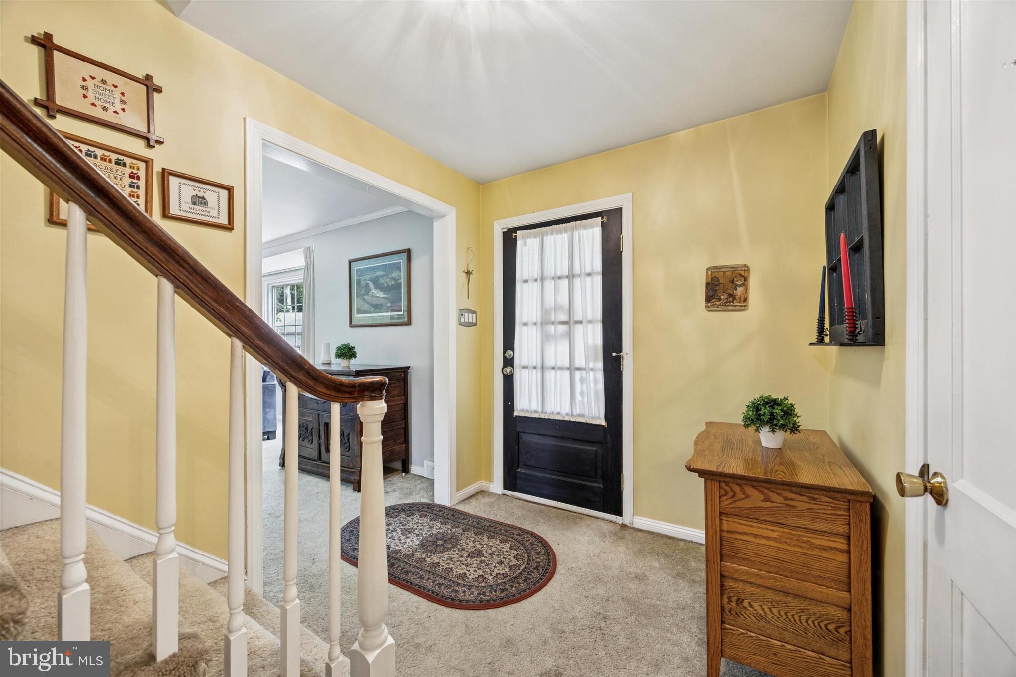 444 Kerr Lane Springfield, PA 19064 - Photo 3 of 35 a front view of a house with entryway and wooden floor