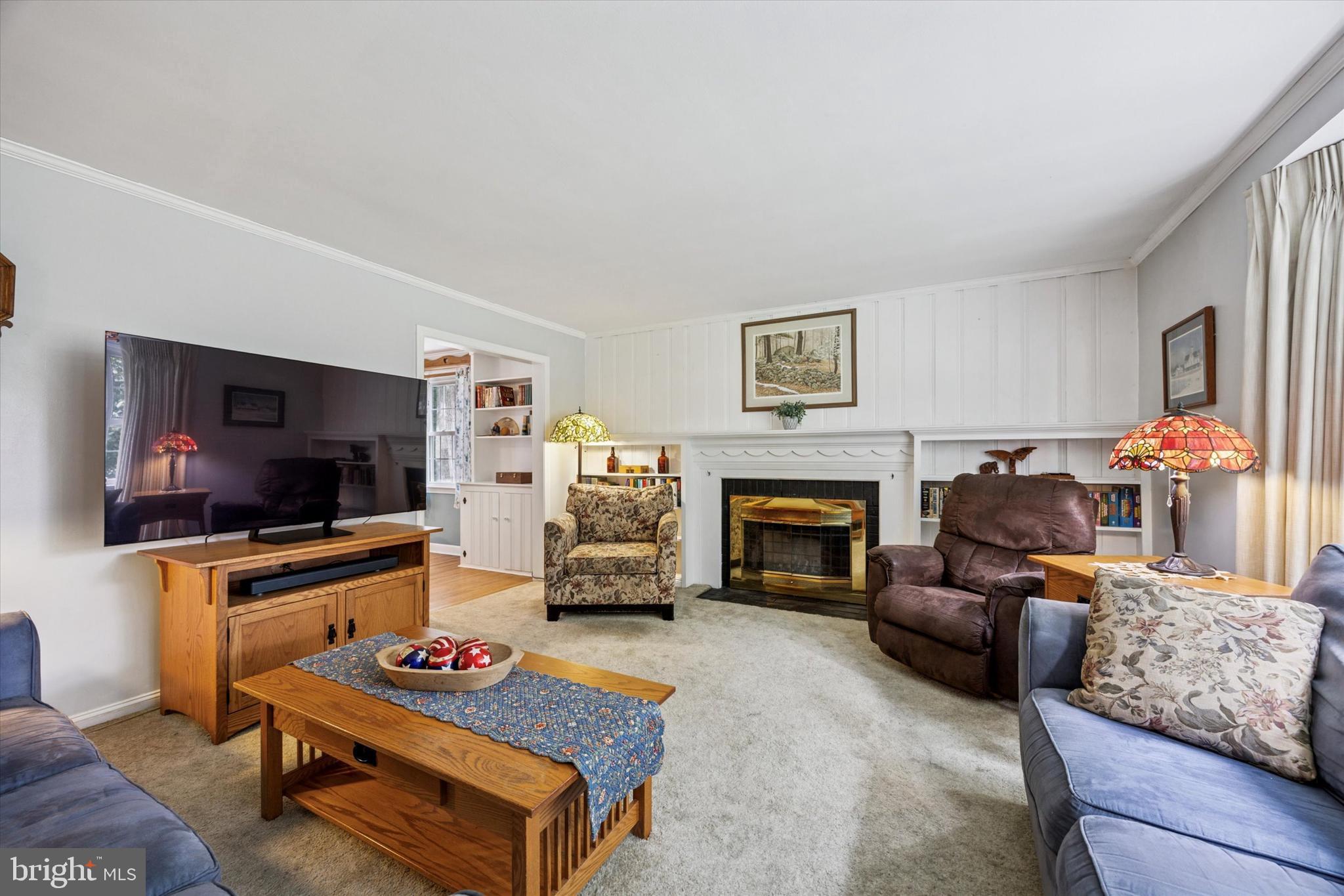 444 Kerr Lane Springfield, PA 19064 - Photo 6 of 35 a living room with furniture and a flat screen tv