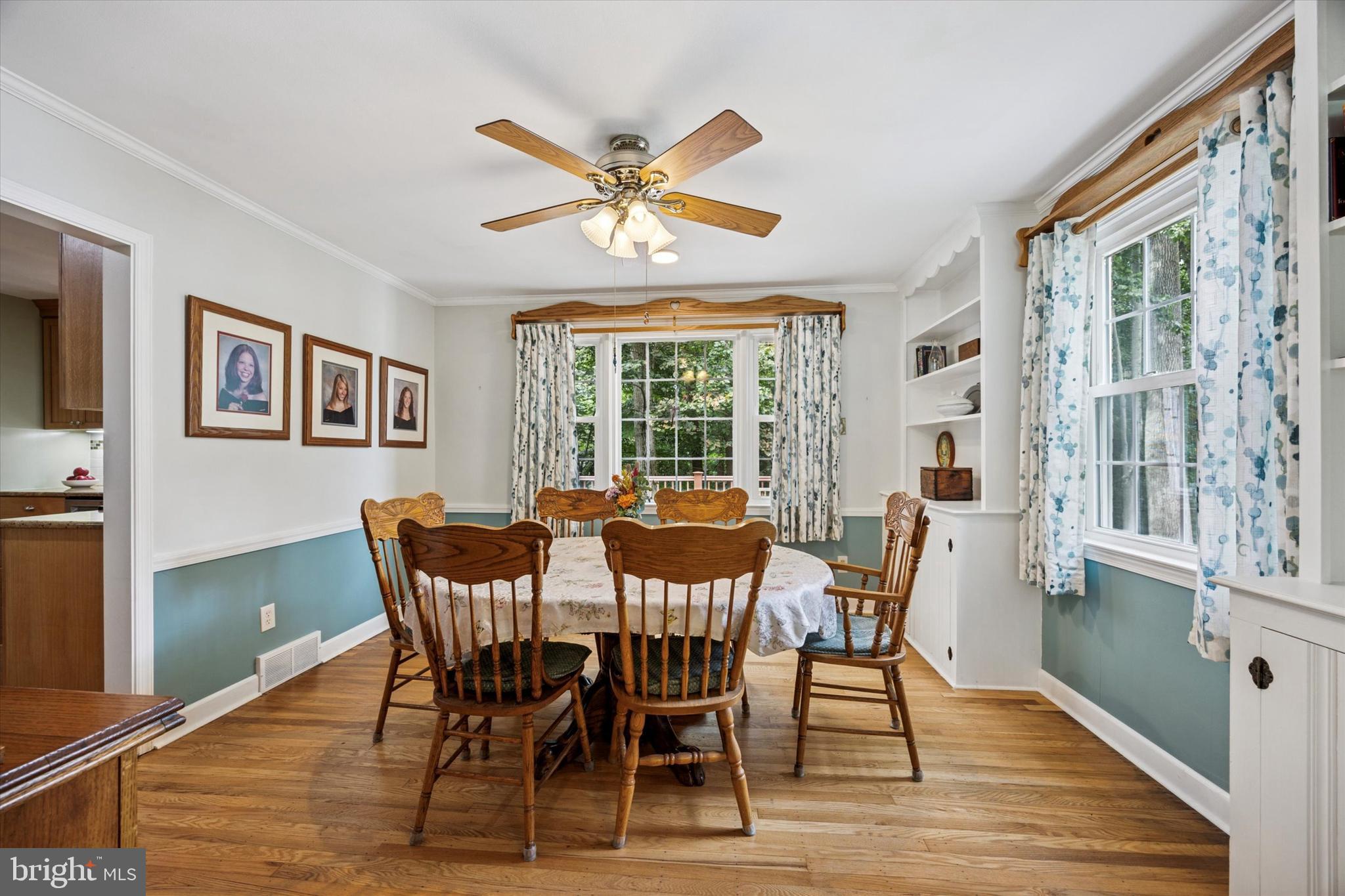 444 Kerr Lane Springfield, PA 19064 - Photo 8 of 35 a view of a dining room with furniture window and wooden floor