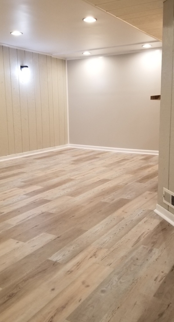 14345 Park Avenue, Unit GARDEN Harvey, IL 60426 - Photo 3 of 6 an empty room with wooden floor and windows in it