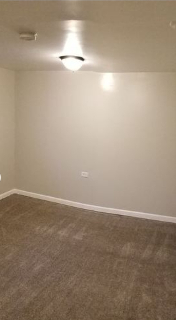 14345 Park Avenue, Unit GARDEN Harvey, IL 60426 - Photo 5 of 6 a view of an empty room