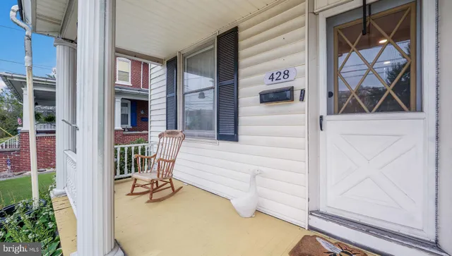 a view of balcony and furniture