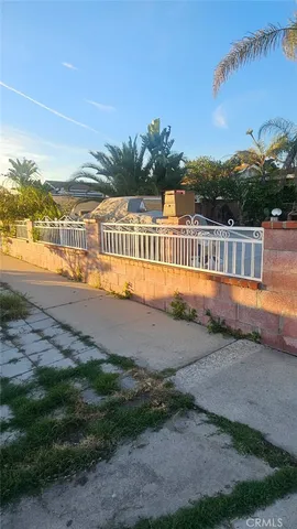 a view of a lake with a house in the background