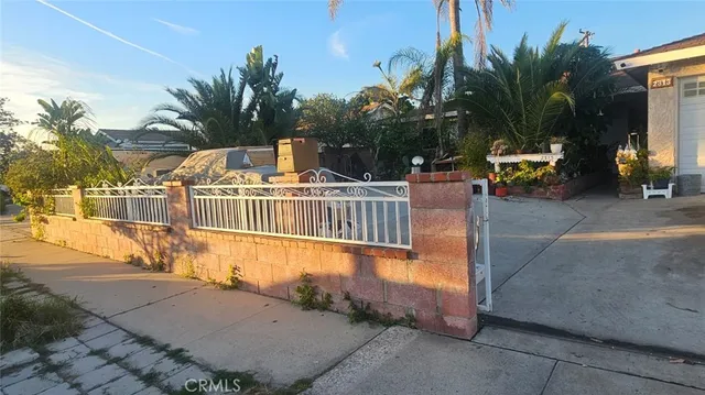 a view of a house with outdoor space and lake view