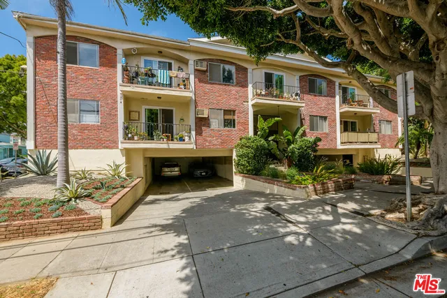 a front view of a house with yard