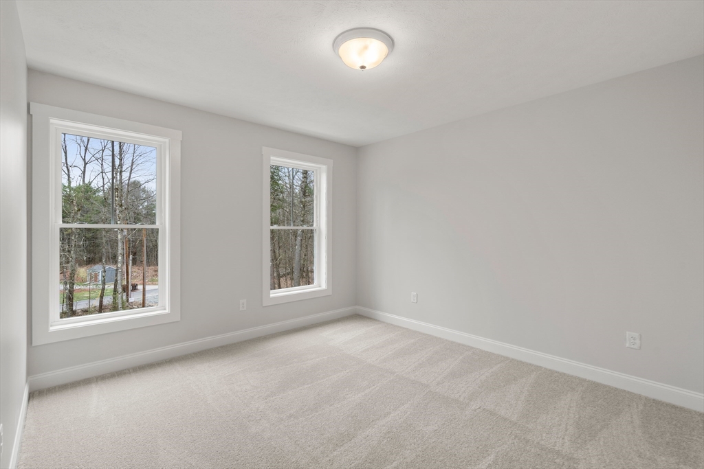 43 Old Colony Road Princeton, MA 01541 - Photo 13 of 23 an empty room with a window