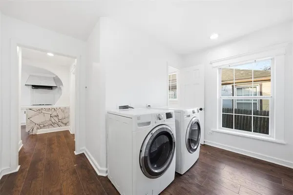 a utility room with dryer and washer