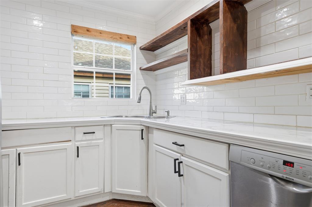 2712 Live Oak Avenue Waco, TX 76708 - Photo 6 of 15 a view with cabinets a sink and dishwasher in it