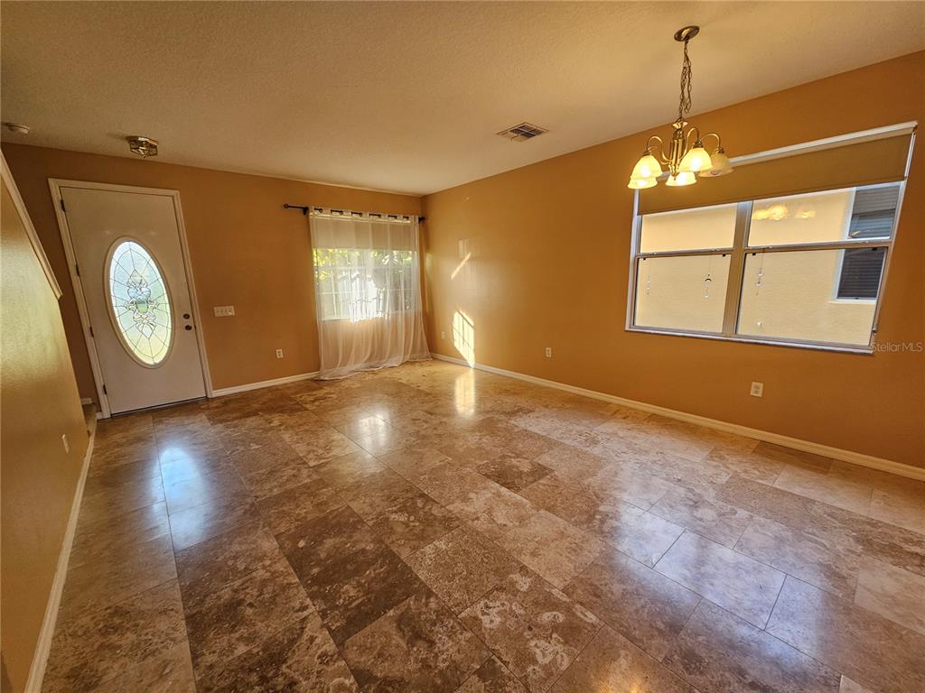 1881 Strathmore Circle Mount Dora, FL 32757 - Photo 2 of 16 a view of livingroom with window