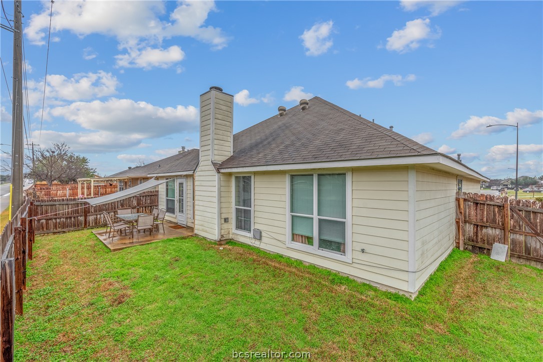 1027 Fallbrook Loop College Station, TX 77845 - Photo 20 of 20 a view of a house with a yard and sitting area