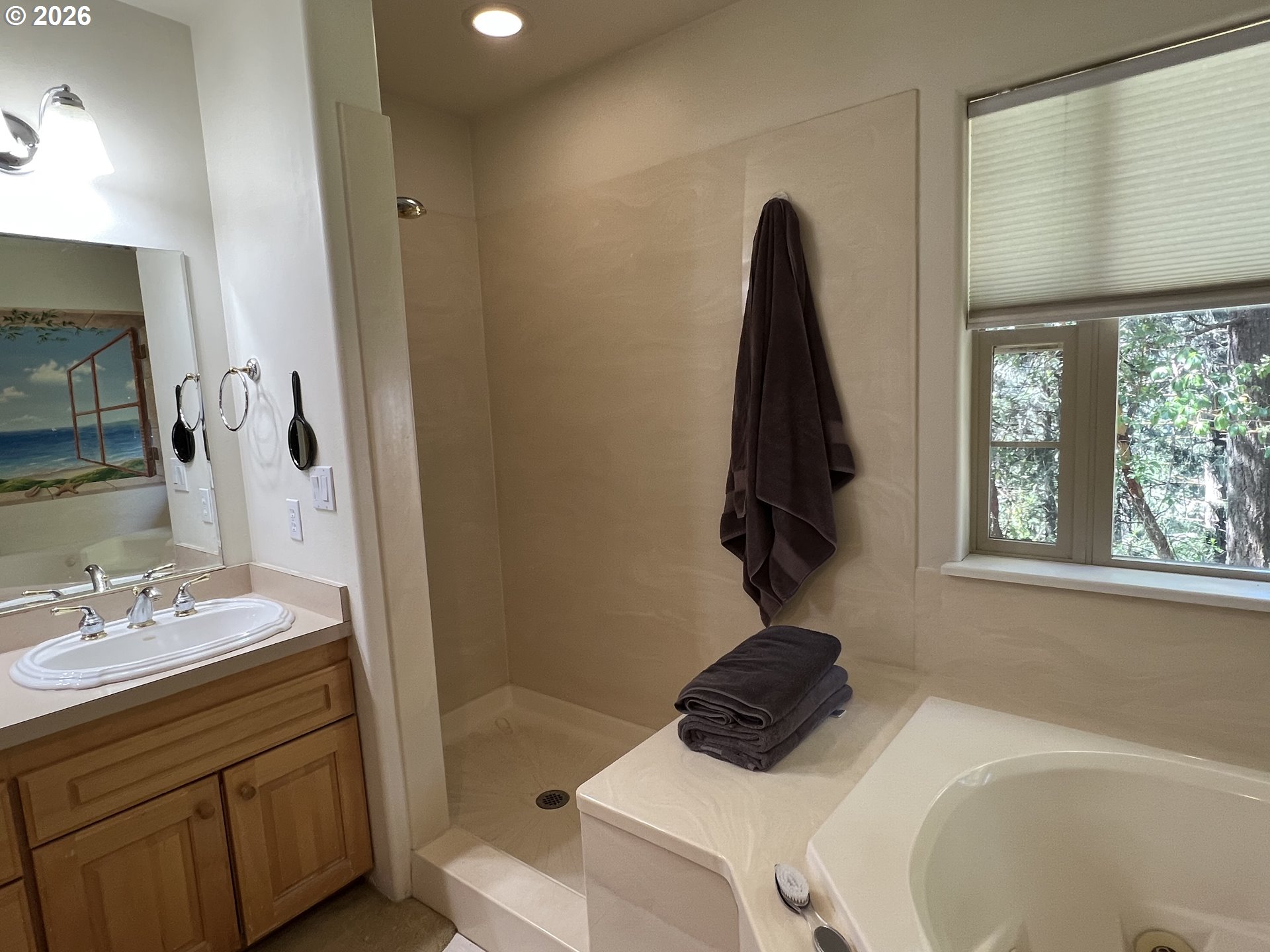 28544 Crow Road Eugene, OR 97402 - Photo 21 of 48 a bathroom with a sink a toilet and shower