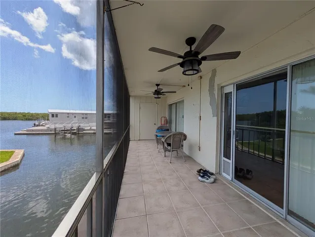 a view of empty room with furniture and wooden floor