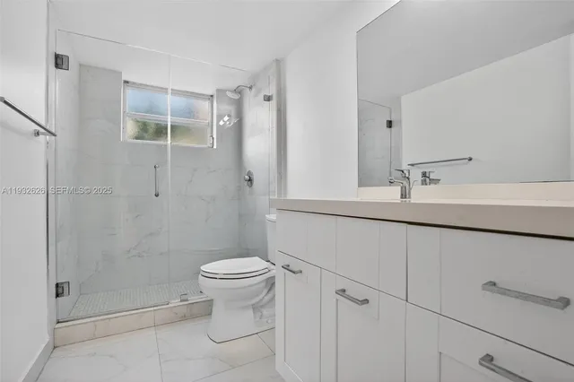 a view of a storage & utility room with washer and dryer