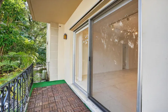 a view of a garden with a patio