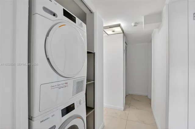a view of a storage & utility room with washer and dryer