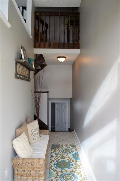 212 Grace Street McKees Rocks, PA 15136 - Photo 2 of 25 Gorgeous multi-level entry way with access to game room or the main living area.