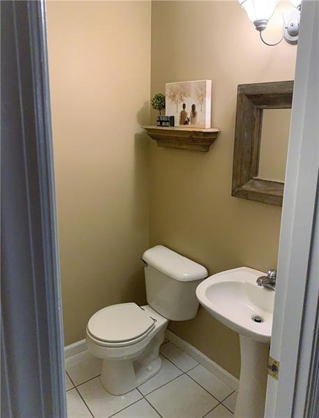 212 Grace Street McKees Rocks, PA 15136 - Photo 11 of 25 Main floor powder room provides convenience.
