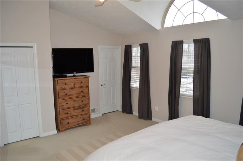 212 Grace Street McKees Rocks, PA 15136 - Photo 13 of 25 Master bedroom with loads of natural lighting and high ceilings. Large master closet and en-suite bathroom.