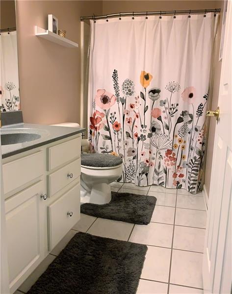 212 Grace Street McKees Rocks, PA 15136 - Photo 19 of 25 Updated and spacious hallway bathroom.