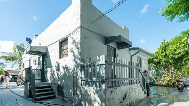 a view of a house with a street