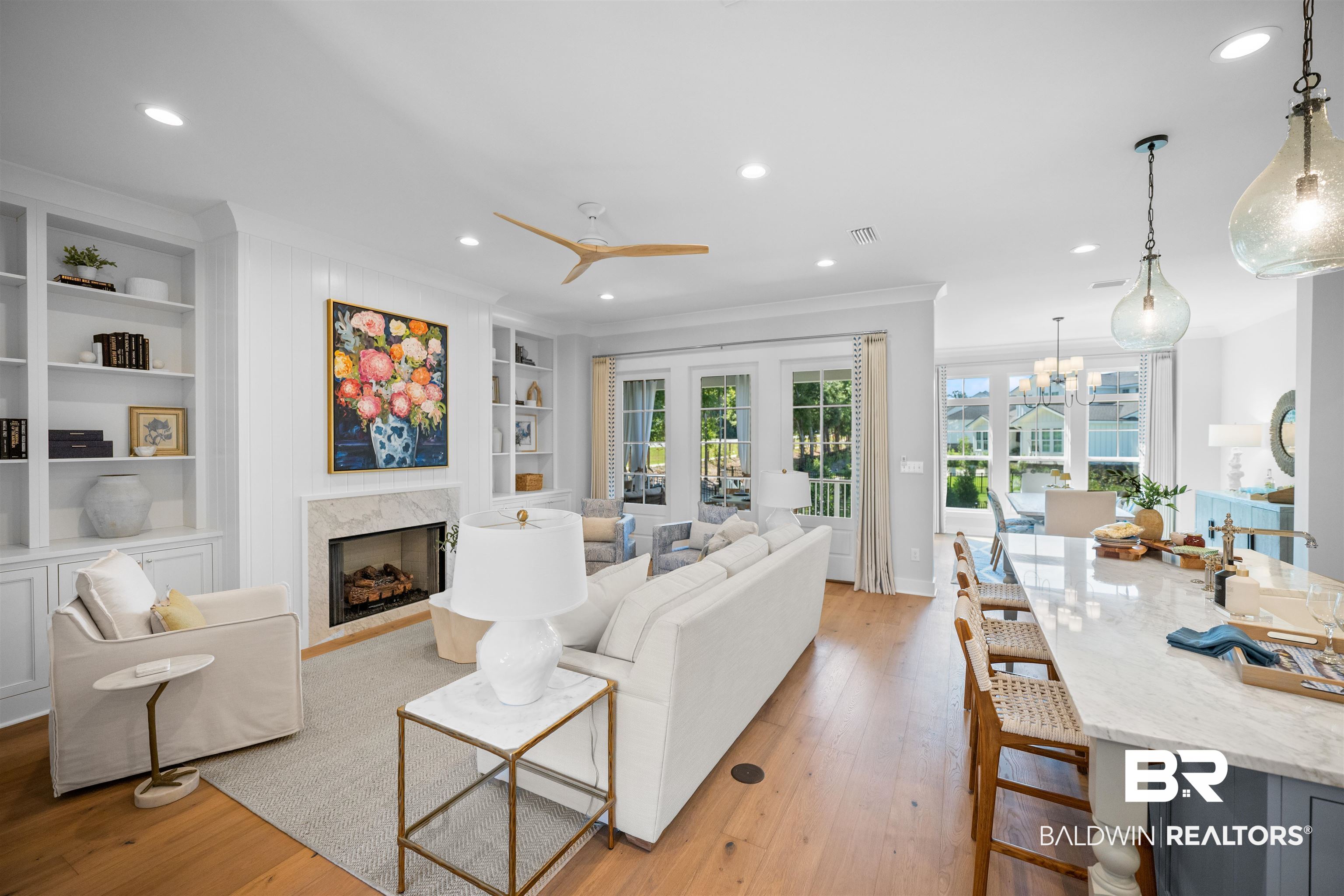 156 Hyacinth Street Fairhope, AL 36532 - Photo 2 of 61 Living area featuring light wood-style flooring, crown molding, recessed lighting, a fireplace, and a ceiling fan