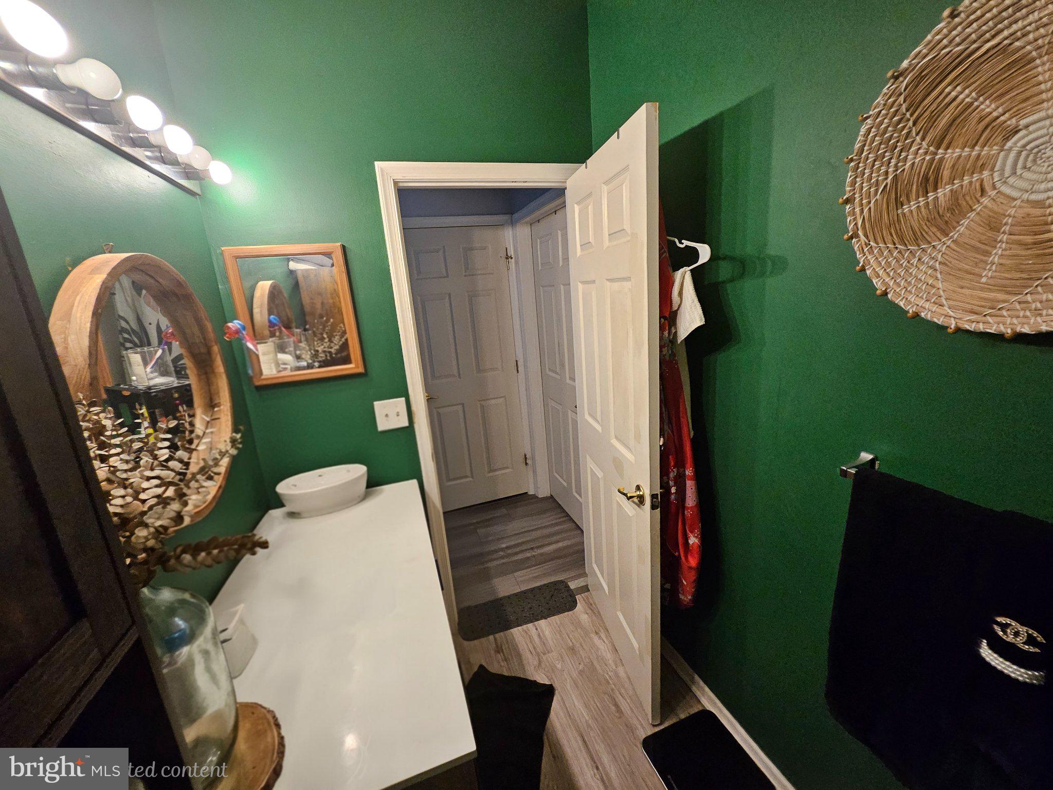 83 Kyle Way Ewing, NJ 08628 - Photo 17 of 36 Chic green bathroom with stylish accents.