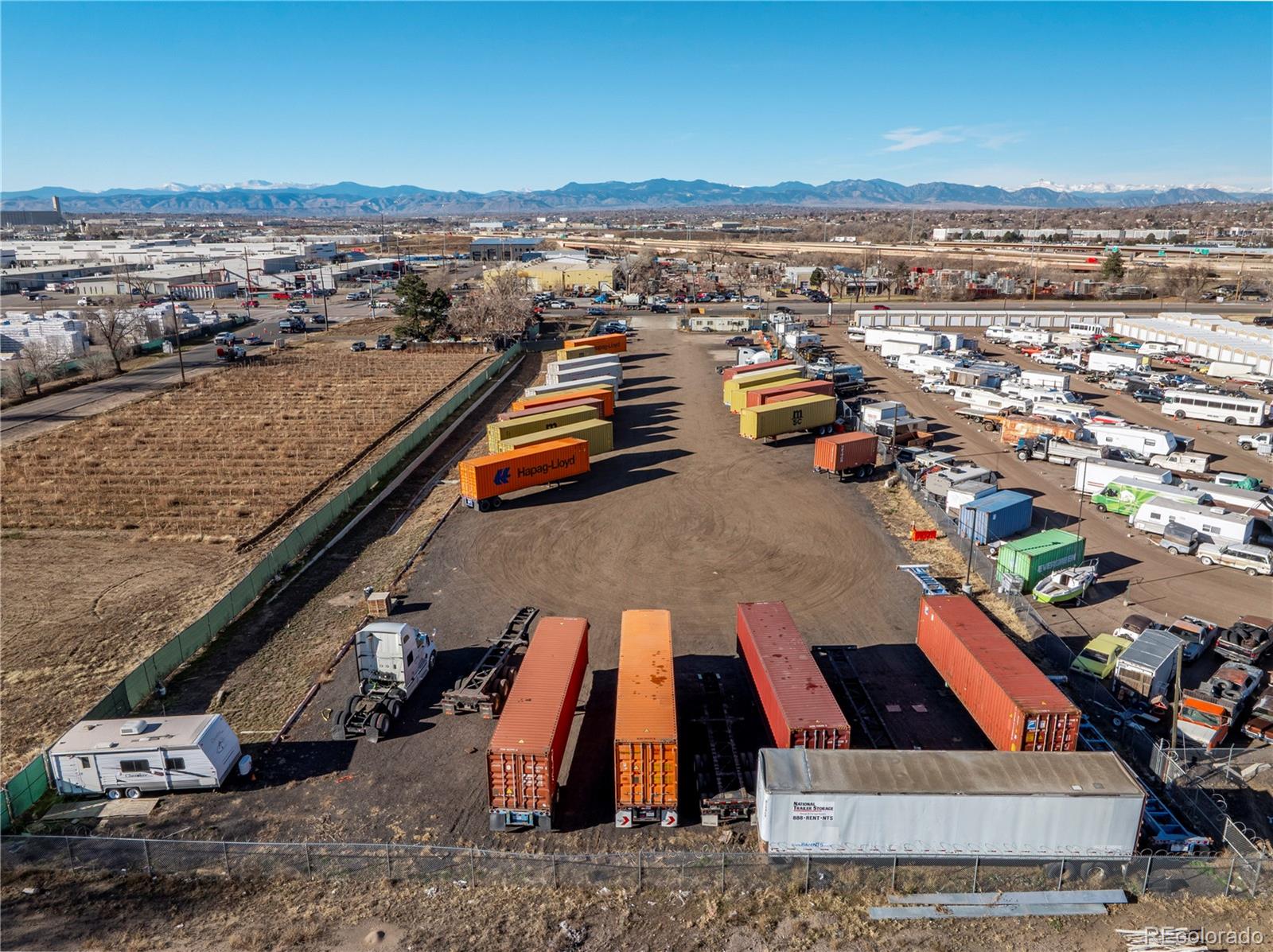 6640 Washington Street Denver, CO 80229 - Photo 1 of 3 an aerial view of residential houses with outdoor space