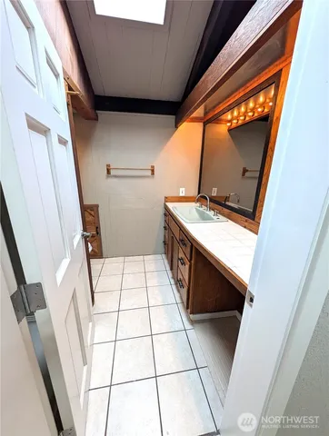 a view of empty room with windows