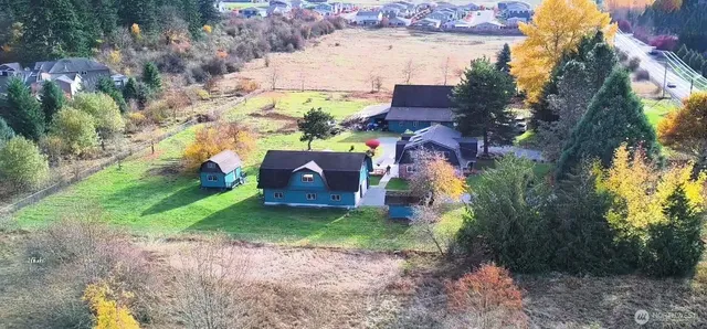 a view of a house with a park