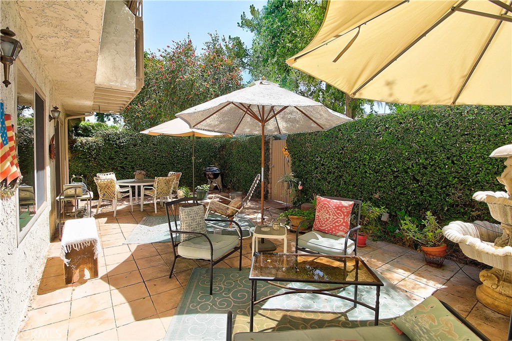 6618 Wintertree Drive Riverside, CA 92506 - Photo 30 of 37 a view of backyard of house with seating space