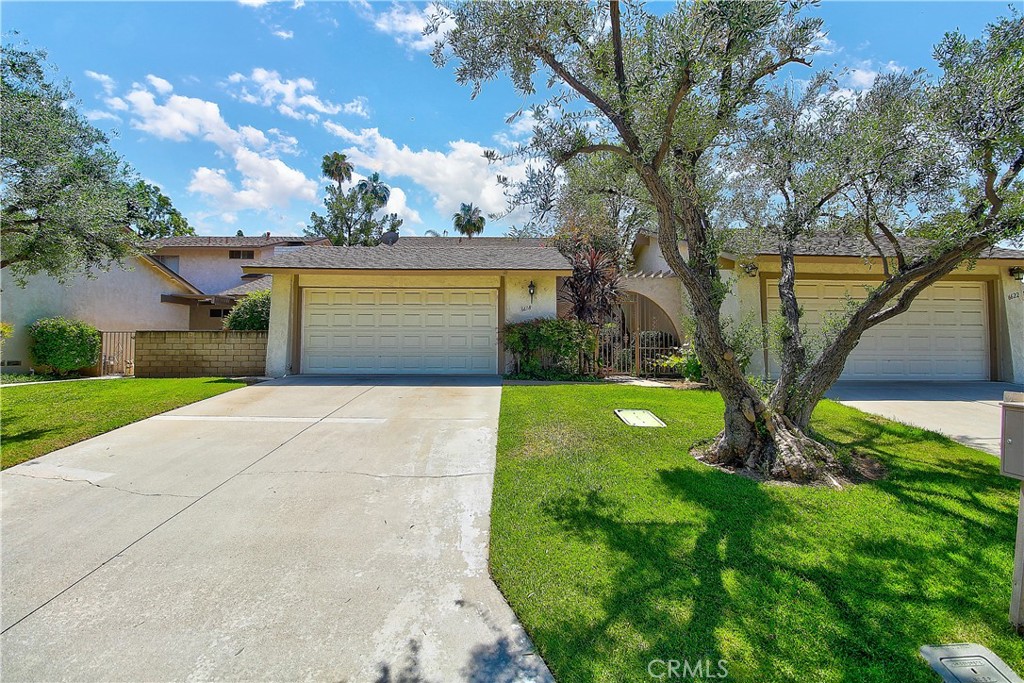 6618 Wintertree Drive Riverside, CA 92506 - Photo 3 of 37 a front view of a house with garden