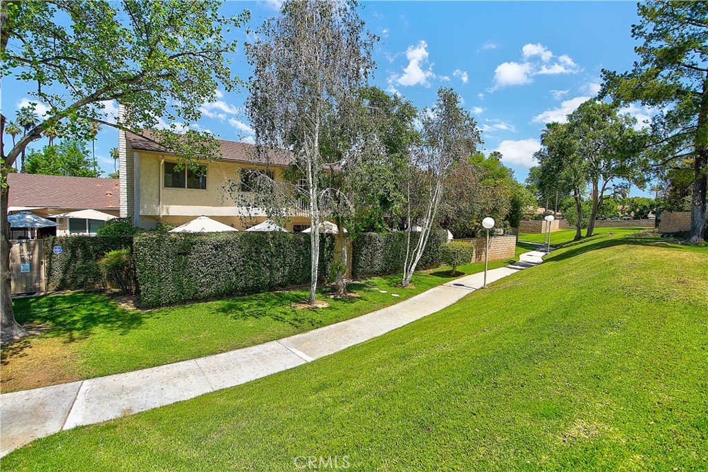 6618 Wintertree Drive Riverside, CA 92506 - Photo 33 of 37 a view of a house with a yard