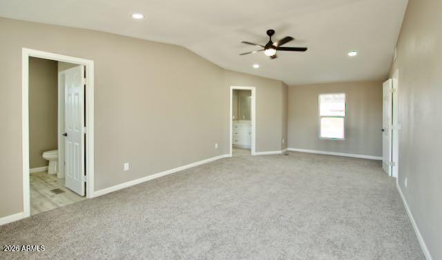 1470 South Bowman Road Apache Junction, AZ 85119 - Photo 13 of 56 a view of an empty room and a ceiling fan window