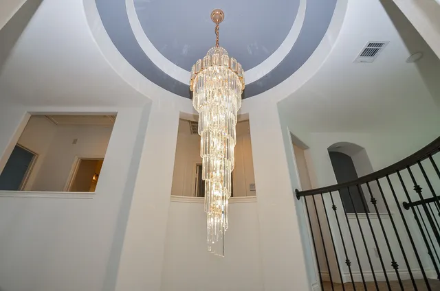 a living room with furniture fireplace and flat screen tv