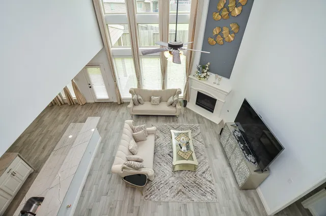 a living room with furniture and a window